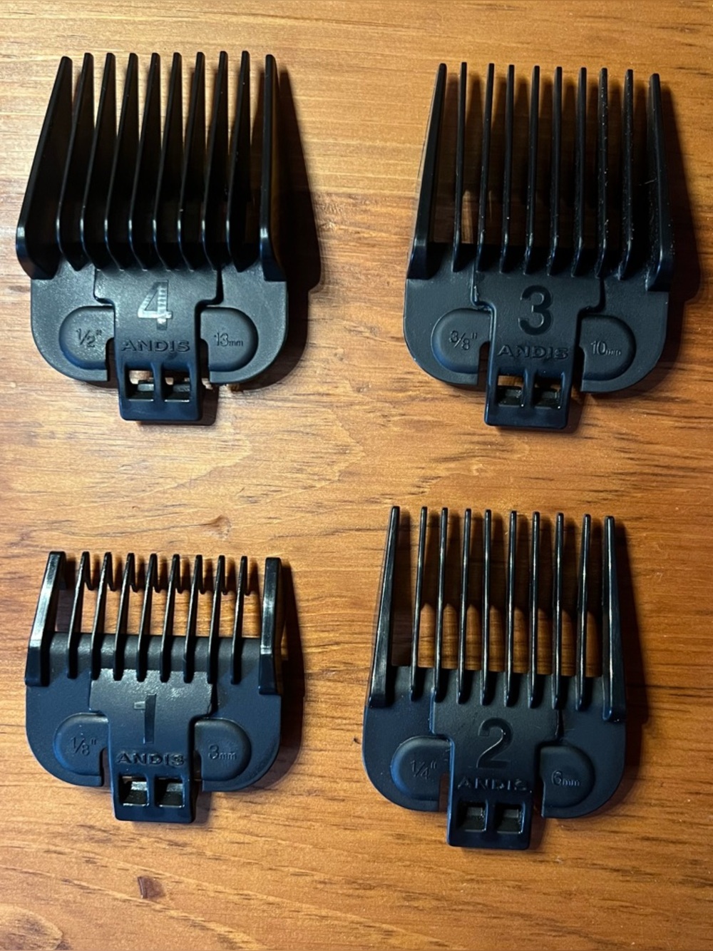Andis Black Clipper Guard Set Sizes 1-4